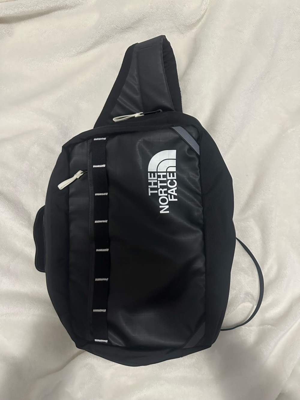 The North Face Black Sling Belt Bag with White Logo